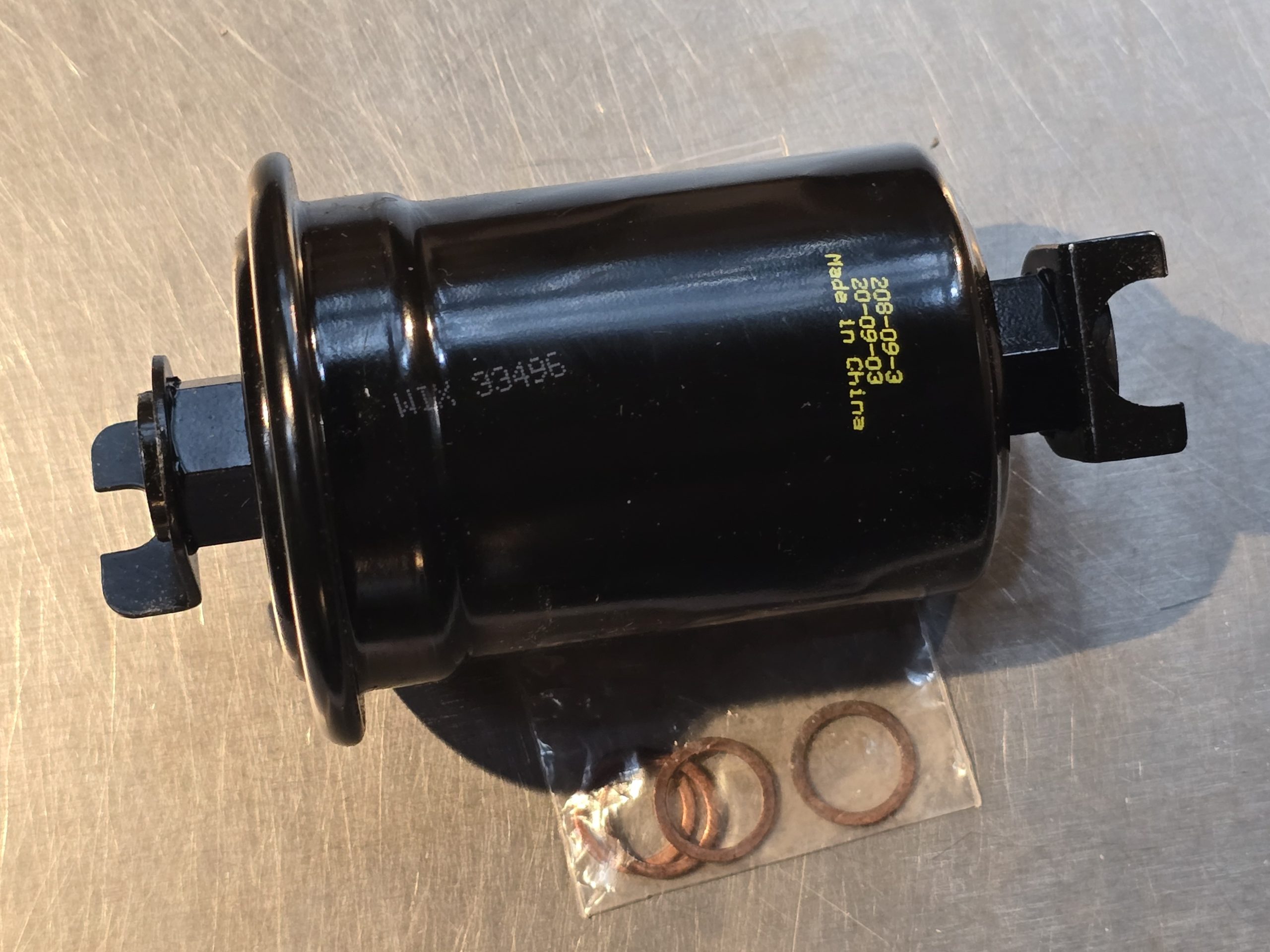 New Genuine WIX 33496 FUEL FILTER